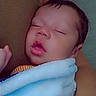 Emiliano is registered to the contest to win money with this photo: baby, sleeping, blanket, arm, tattoo, closeup, indoor, person, child, infant, rest, comfort, soft, peaceful, skin, head, face, mouth, clothing, nap