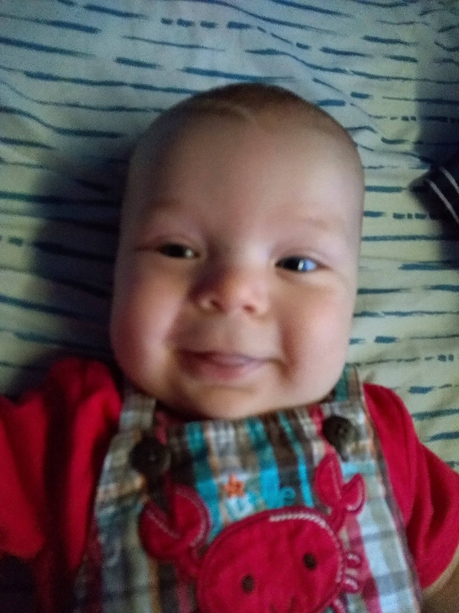 Ezekiel is registered to the contest to win money with this photo: baby, cheek, child, chin, cool, eye, face, facial_expression, forehead, happy, head, iris, joy, lip, mouth, neck, nose, person, red, skin