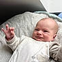 baby, infant, smile, hand, blanket, soft, cozy, face, cute, child, wearing, clothing, heart, patch, lying, indoors, plush, warm, happy, newborn