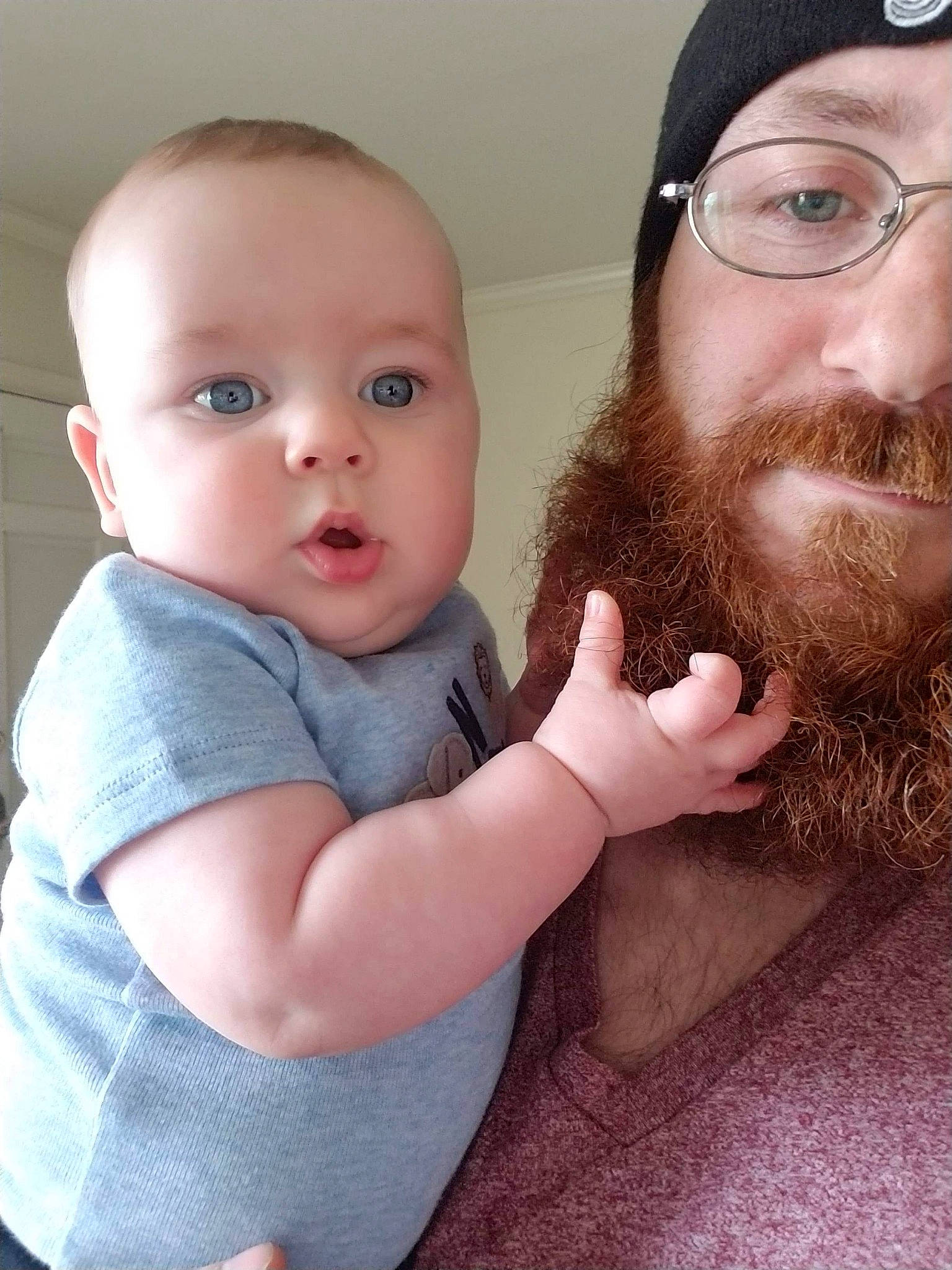 Gordon is registered to the contest to win money with this photo: baby, beard, cheek, child, chin, eye, eyebrow, face, facial_hair, forehead, hair, hairstyle, head, lip, moustache, nose, people, person, selfie, skin