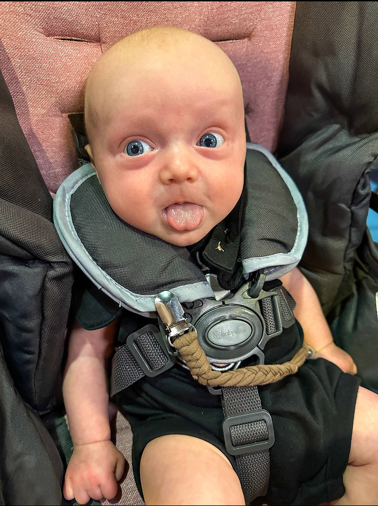 Waylon is registered to the contest to win money with this photo: auto_part, baby, baby_carriage, baby_products, baby_safety, baby_toddler_clothing, car_seat, cheek, child, comfort, cool, eye, iris, person, personal_protective_equipment, product, seat_belt, sitting, skin, strap