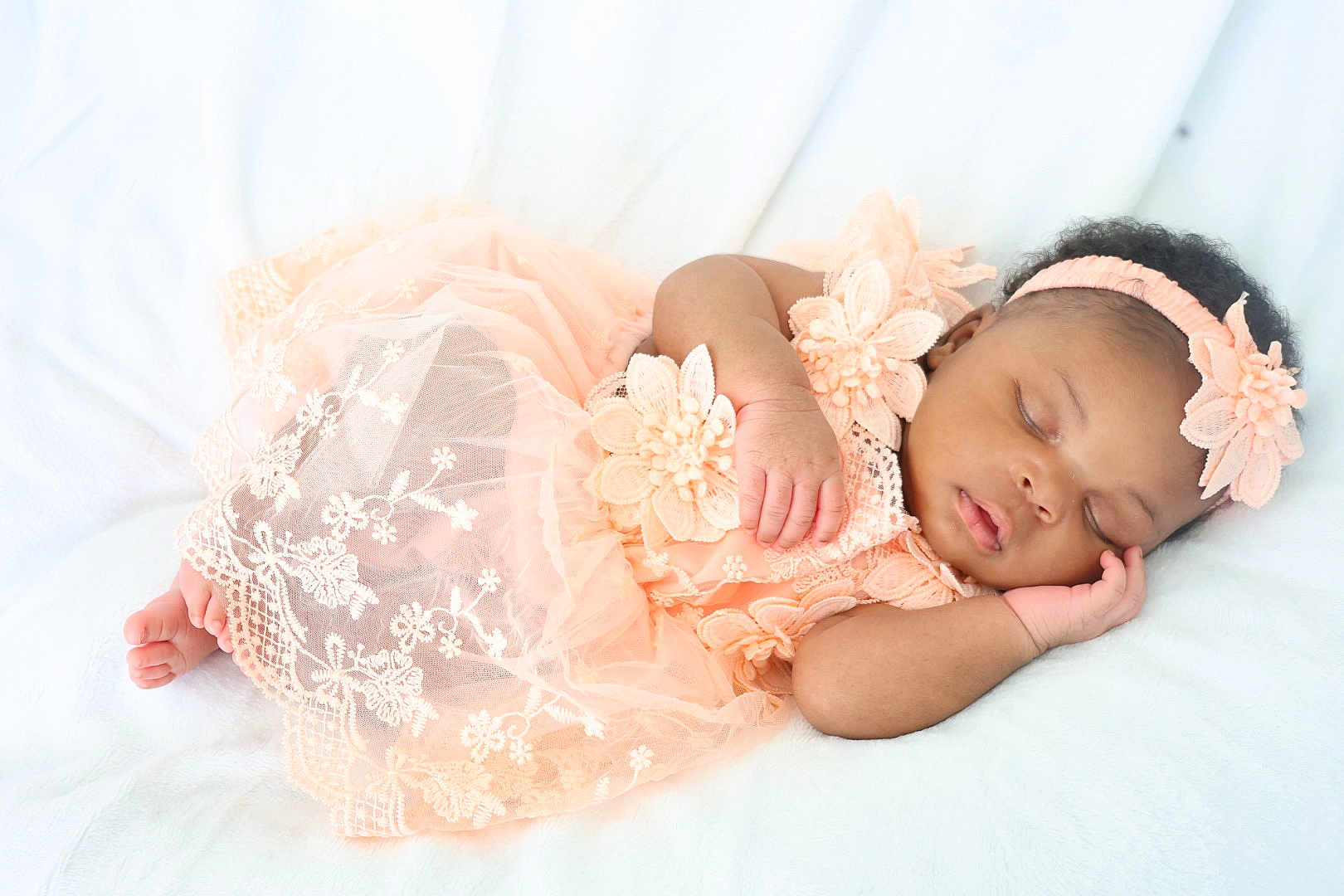 Myka joined the competition — help win amazing prizes! baby, sleeping, peach_dress, lace, headband, infant, soft_blanket, peaceful, cute, portrait, newborn, child, resting, indoors, adorable, toddler, sleep, closeup, delicate, calm