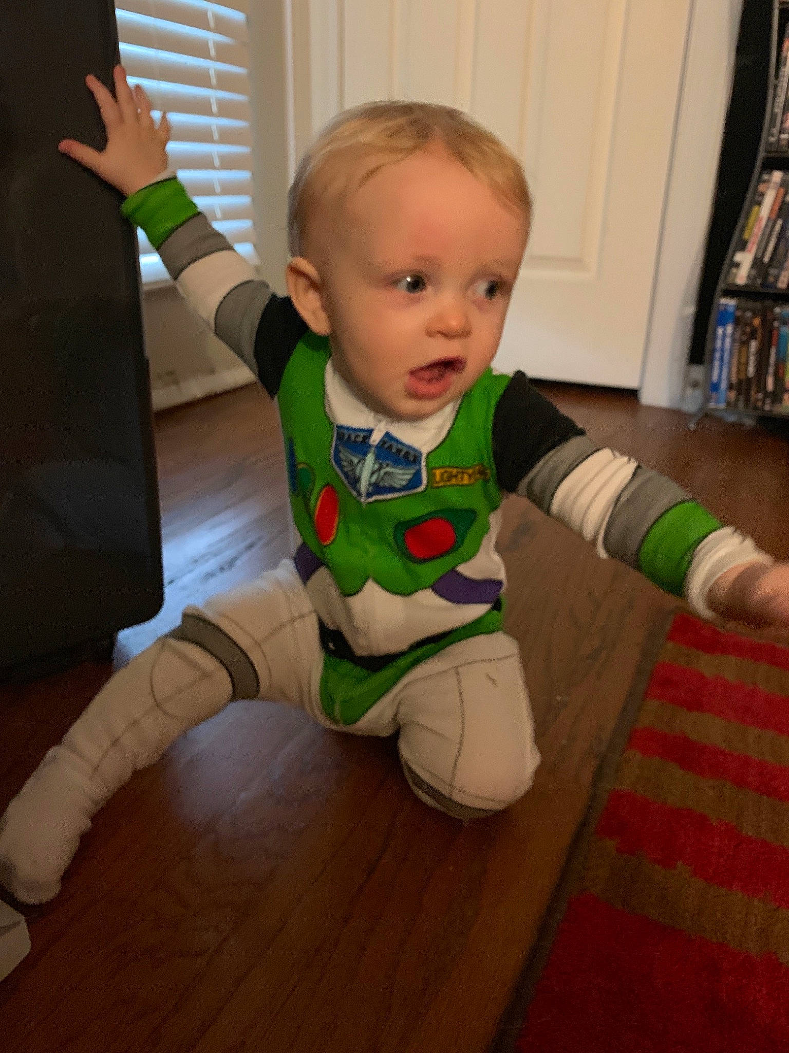 Linkin is registered to the contest to win money with this photo: arm, baby, child, floor, flooring, person, play, toddler