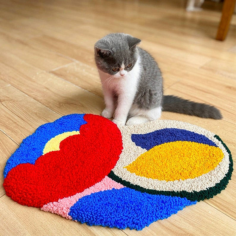 Daisy participe au concours pour gagner de l'argent avec cette photo : art, carmine, cat, comfort, electric_blue, felidae, floor, flooring, fur, hardwood, pattern, paw, pet_supply, rodent, small_to_medium_sized_cats, tail, whiskers, wood, wool, woolen