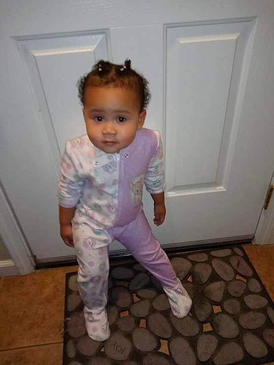 Journee is registered to the contest to win money with this photo: baby, baby_toddler_clothing, child, child_model, door, floor, flooring, foot, home_door, nightwear, person, standing, toddler