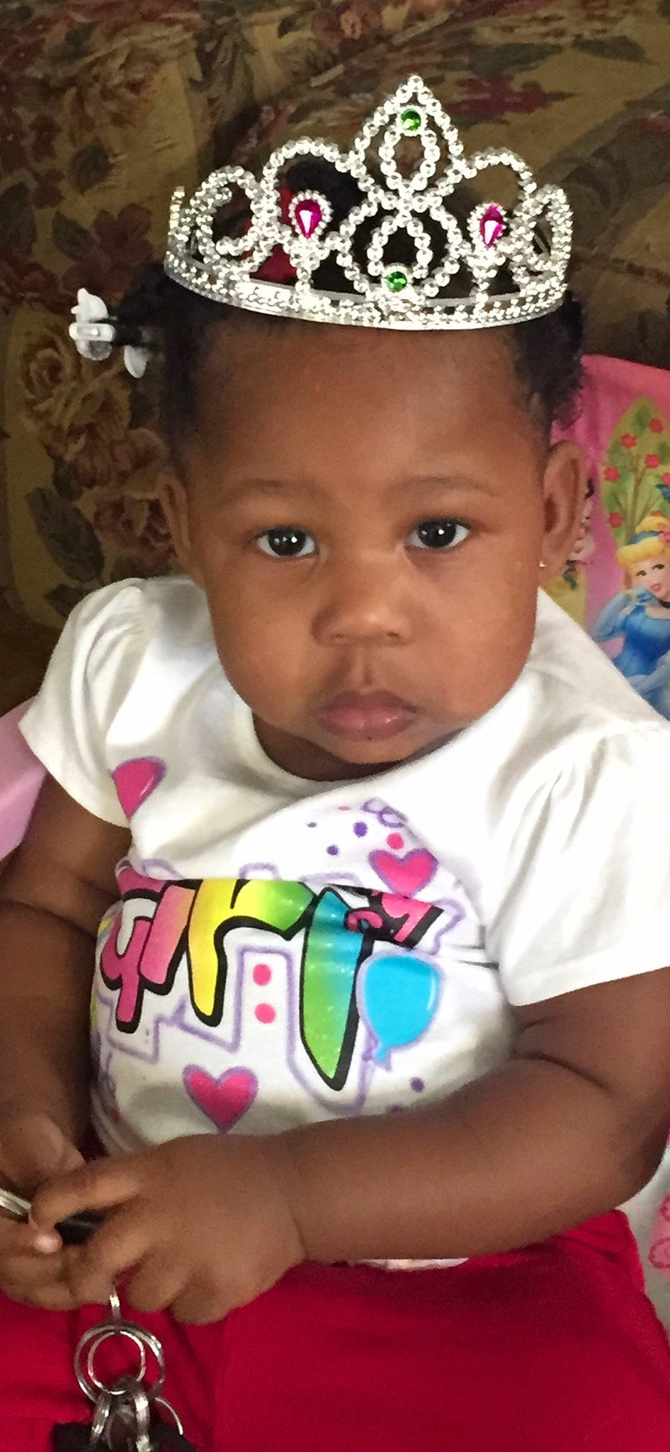 Ciara is registered to the contest to win money with this photo: baby, baby_toddler_clothing, cap, cheek, chin, eye, eyebrow, eyelash, forehead, green, hairstyle, happy, head, iris, lip, nose, organ, person, pink, skin