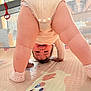 baby, child, upside_down, playpen, playmat, smiling, infant, legs, socks, crawling, indoors, cute, chubby, happy, floor, toy, soft_surface, home, person, young