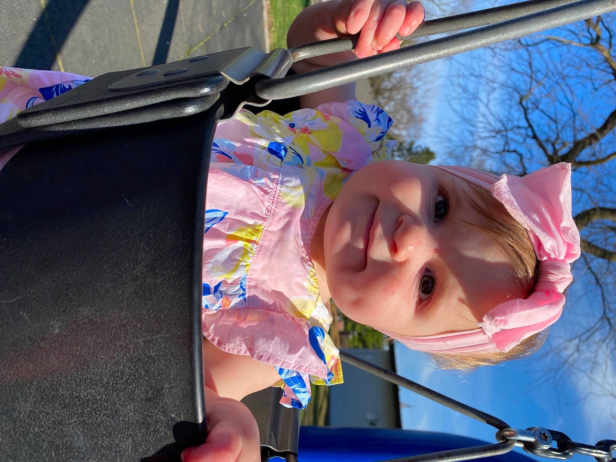 Presley is registered to the contest to win money with this photo: art, blue, child, chin, eyelash, eyewear, facial_expression, fun, happy, leisure, lip, mouth, person, pink, recreation, skin, sky, smile, tree, water