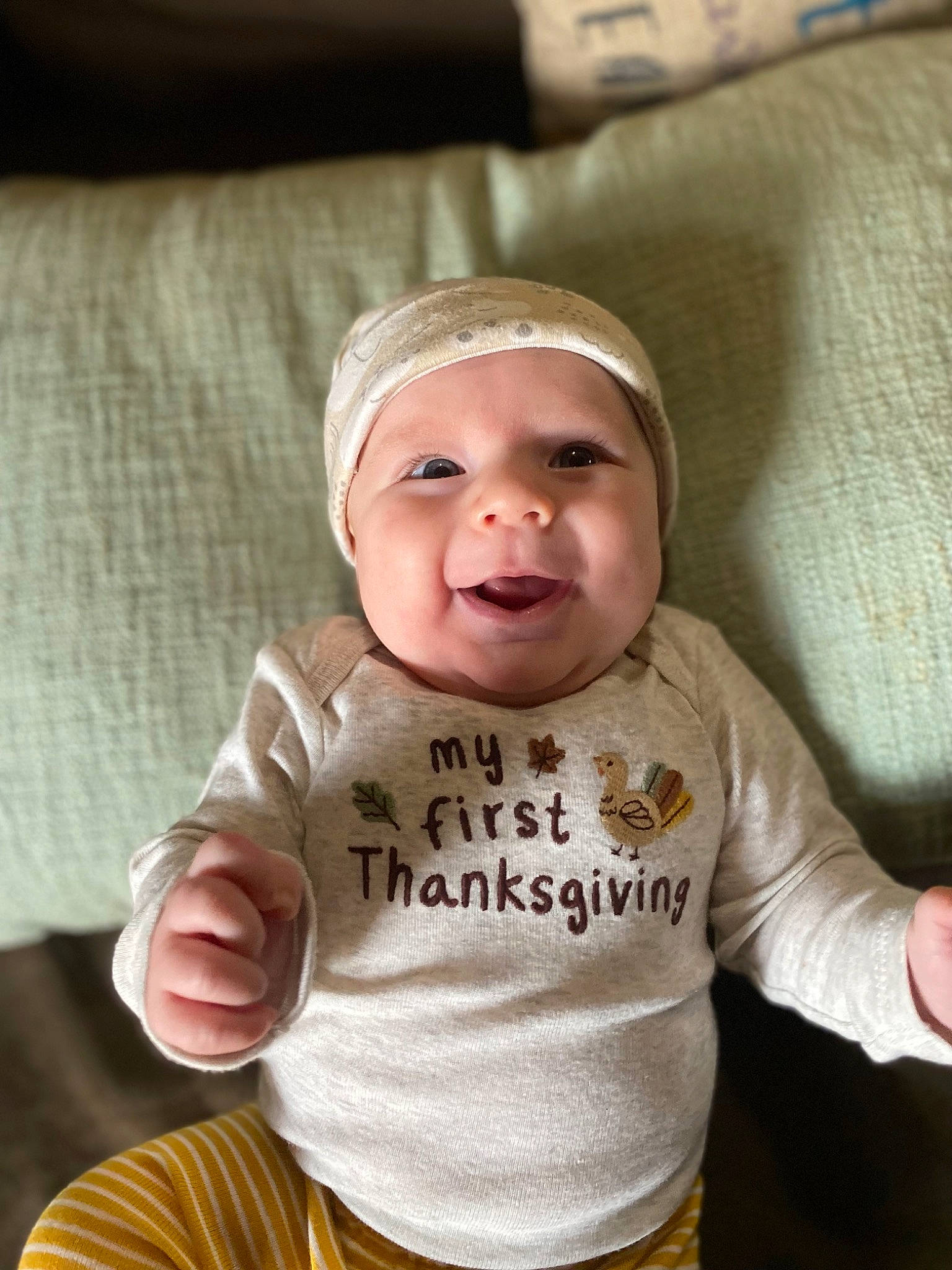 Chandler is registered to the contest to win money with this photo: baby, baby_toddler_clothing, cap, cheek, child, chin, comfort, eye, finger, gesture, happy, hat, headwear, iris, lip, mouth, nose, person, skin, sleeve