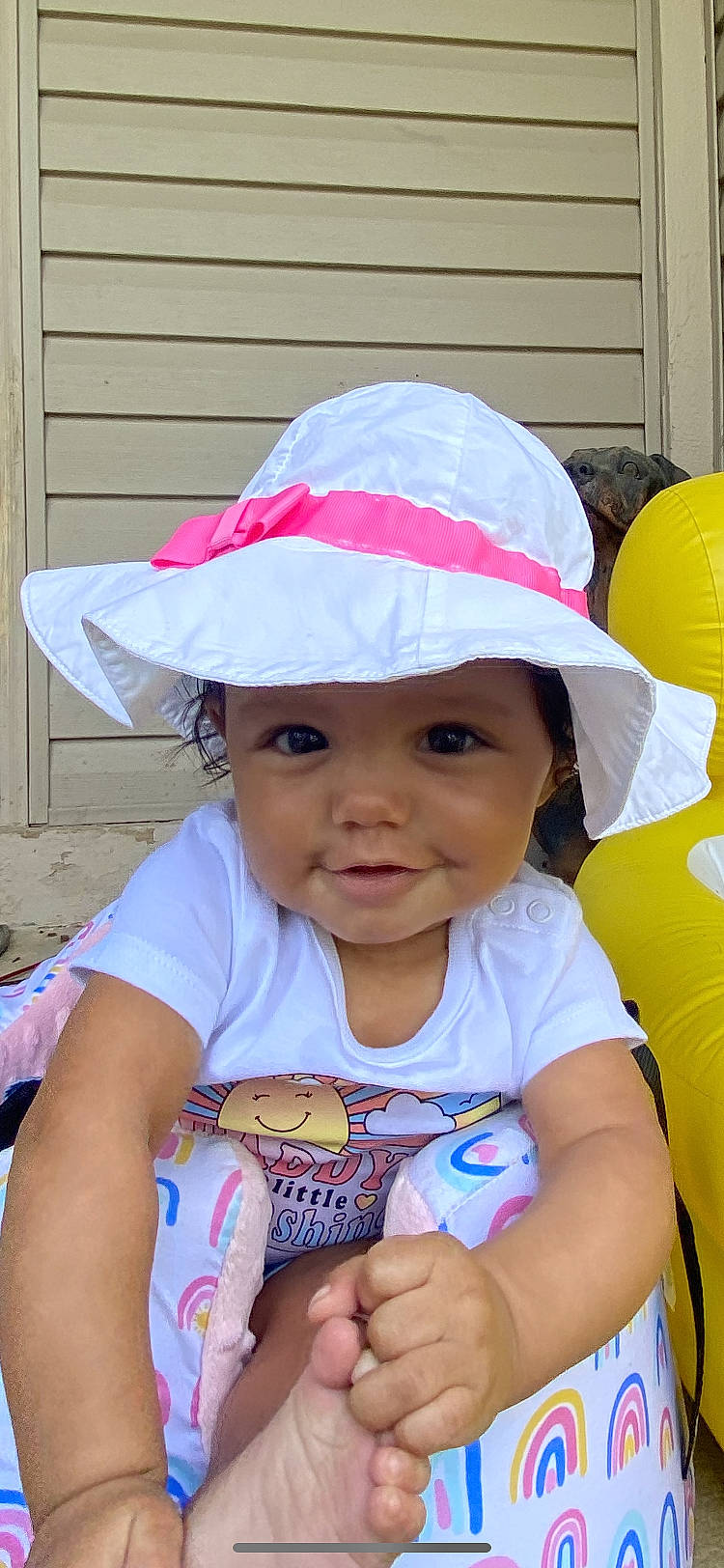 Kehlani is registered to the contest to win money with this photo: baby, baby_toddler_clothing, cap, child, fun, happy, hat, headgear, headwear, leisure, magenta, party_supply, person, pink, purple, recreation, red, skin, smile, sun_hat