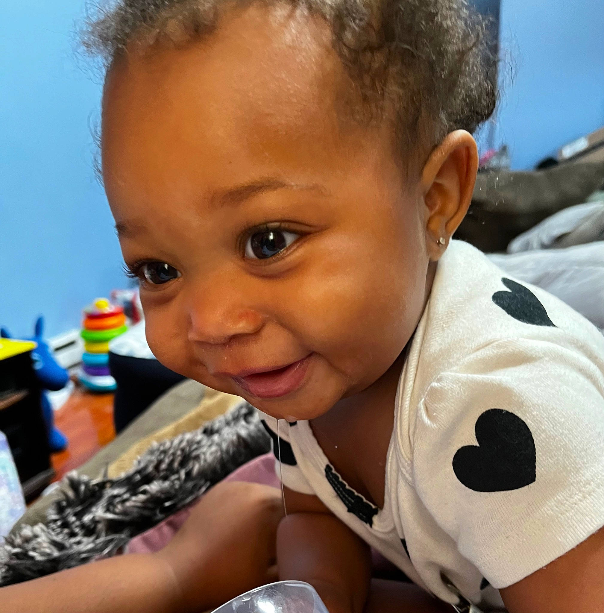 Blessyn is registered to the contest to win money with this photo: arm, baby, baby_toddler_clothing, black_hair, cheek, child, ear, eyebrow, eyelash, hairstyle, happy, head, human_body, iris, lip, nose, person, skin, sky, smile