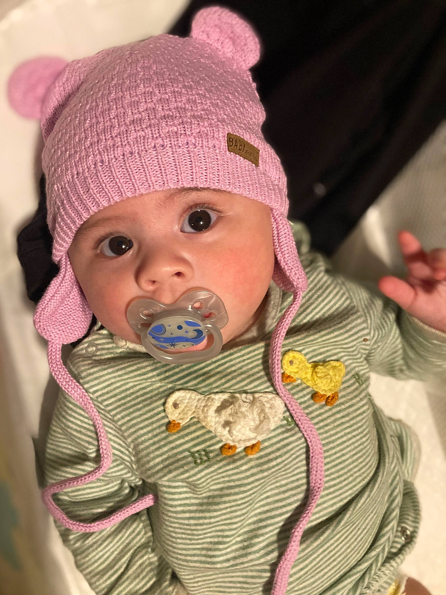 Ayla is registered to the contest to win money with this photo: baby, baby_toddler_clothing, cap, cheek, clothing, eye, face, fun, head, headwear, jacket, knit_cap, lip, magenta, nose, person, pink, skin, sleeve, toddler