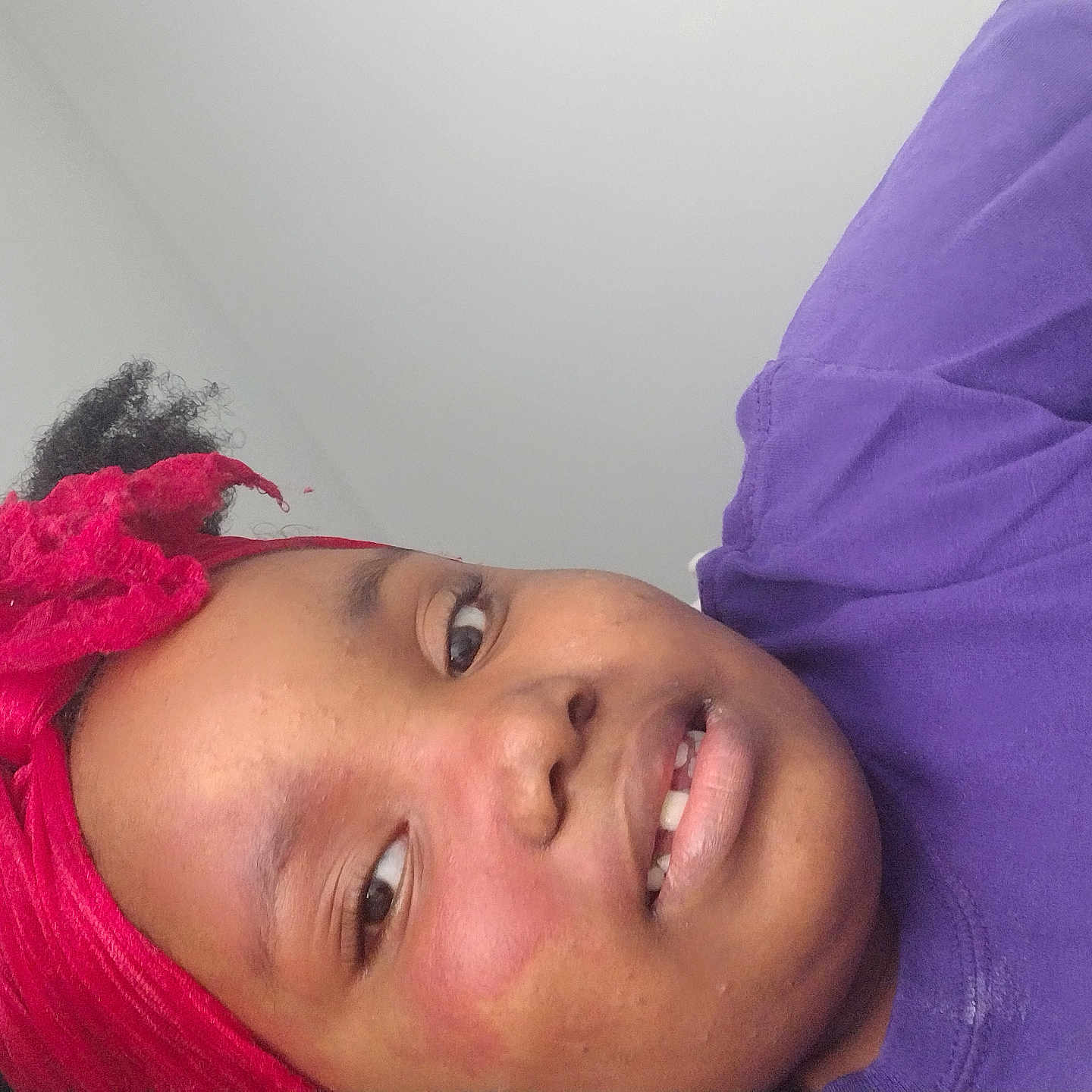 Kennedy joined the competition — help win amazing prizes! accessories, baby, bodypart, bonnet, cap, clothing, earring, face, happy, hat, head, headband, jewelry, mouth, person, photography, portrait, purple, selfie, smile