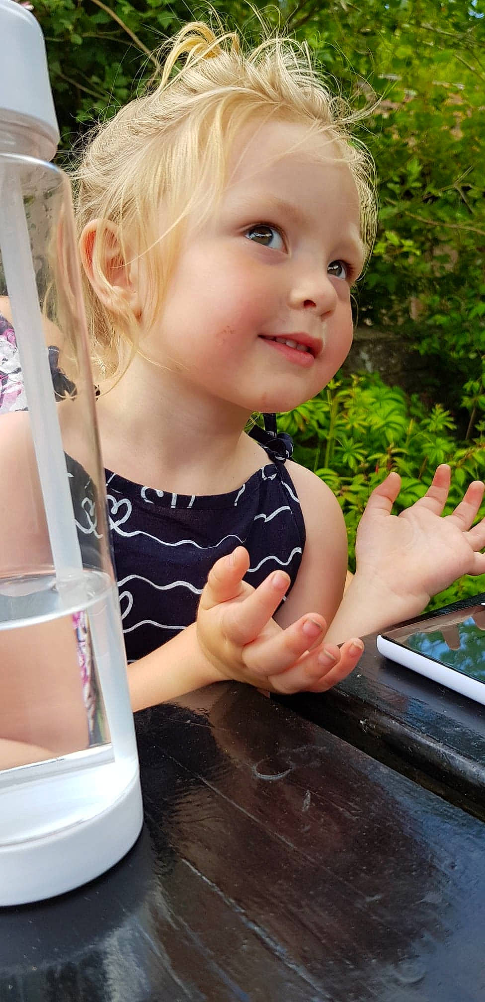 Rosie joined the competition — help win amazing prizes! blond, child, finger, hand, person, play, toddler, water