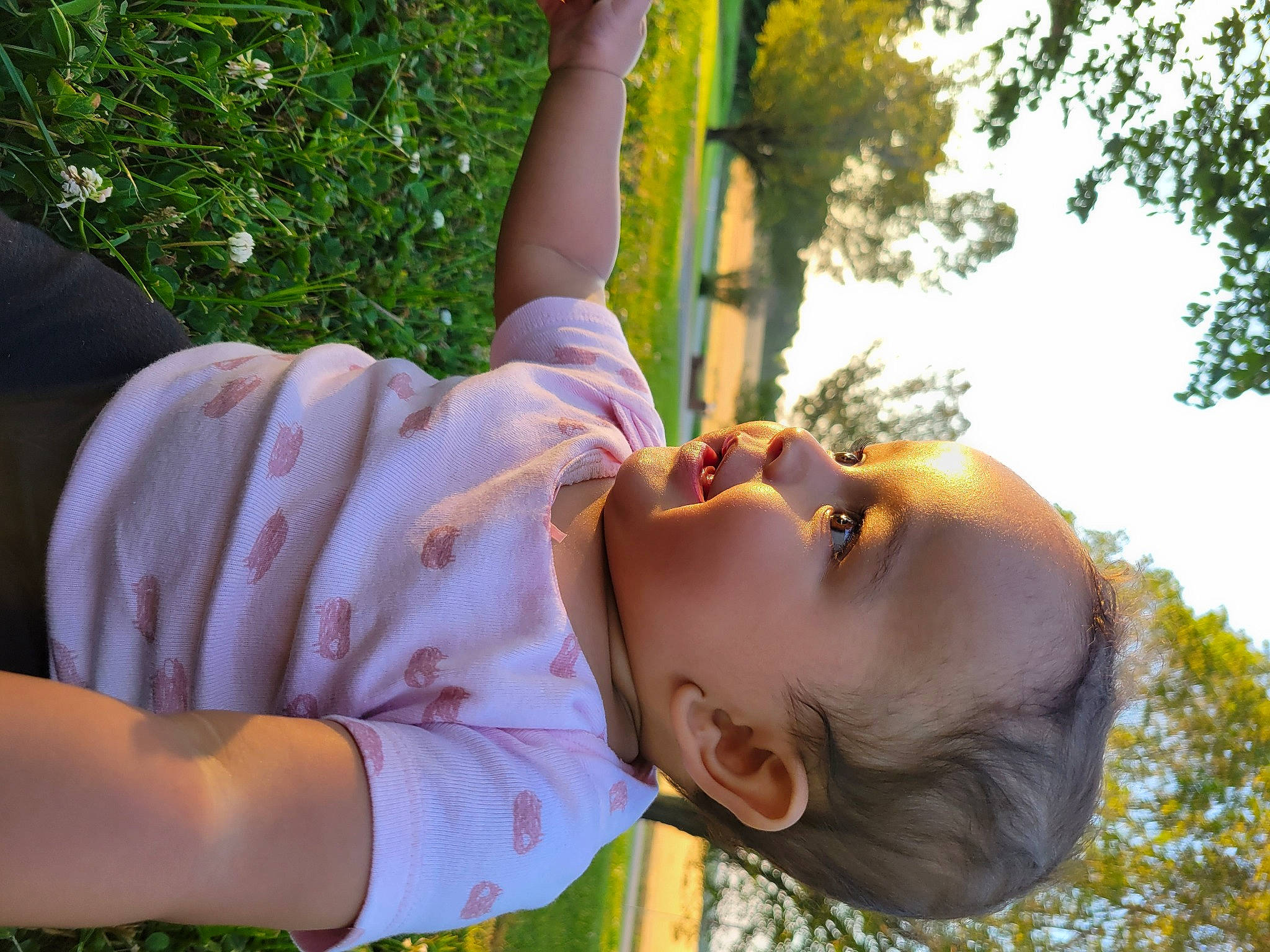 Kylee is registered to the contest to win money with this photo: arm, child, eyewear, finger, fun, gesture, glasses, grass, hand, happy, leaf, leisure, people_in_nature, person, plant, sky, summer, sunglasses, sunlight, toddler