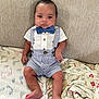 Kash joined the competition — help win amazing prizes! baby, infant, bow_tie, suspenders, couch, blanket, striped_clothing, cute, child, portrait, indoors, fashion, sitting, feet, hands, face, clothing, young_child, casual, home