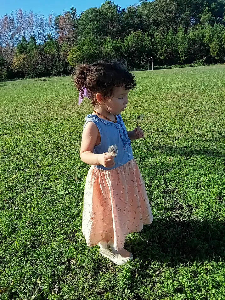 Kayla joined the competition — help win amazing prizes! baby_toddler_clothing, botany, day_dress, dress, grass, grass_family, grassland, green, happy, lawn, leaf, meadow, natural_environment, nature, people_in_nature, person, plain, plant, sky, toddler
