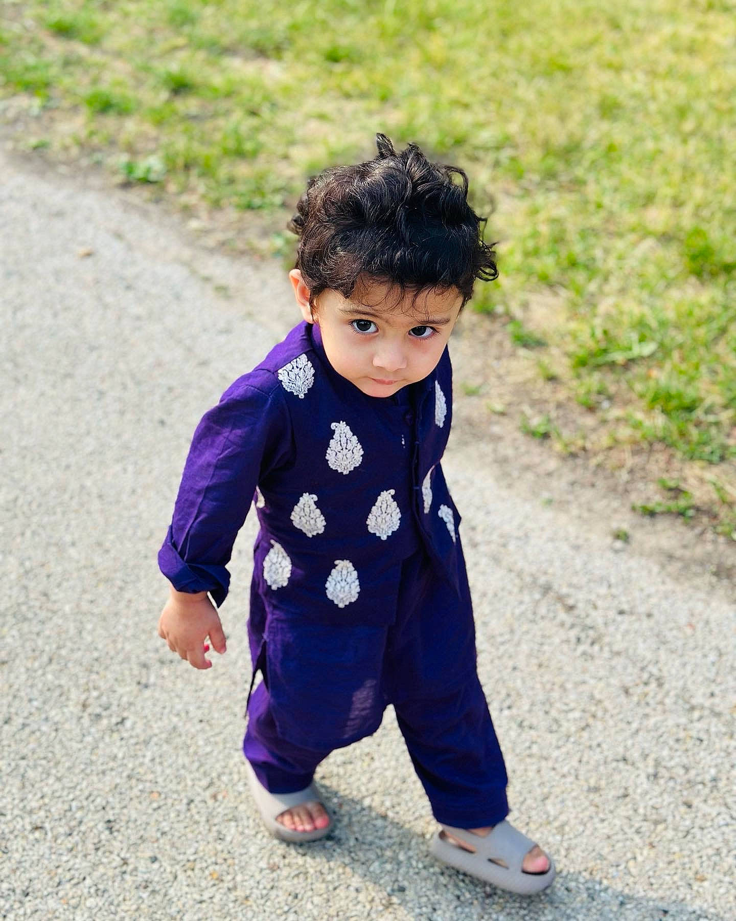 Ali joined the competition — help win amazing prizes! baby, baby_toddler_clothing, black_hair, child, denim, dress, eye, face, grass, happy, leg, leisure, pattern, people_in_nature, person, plant, sleeve, smile, suit, toddler