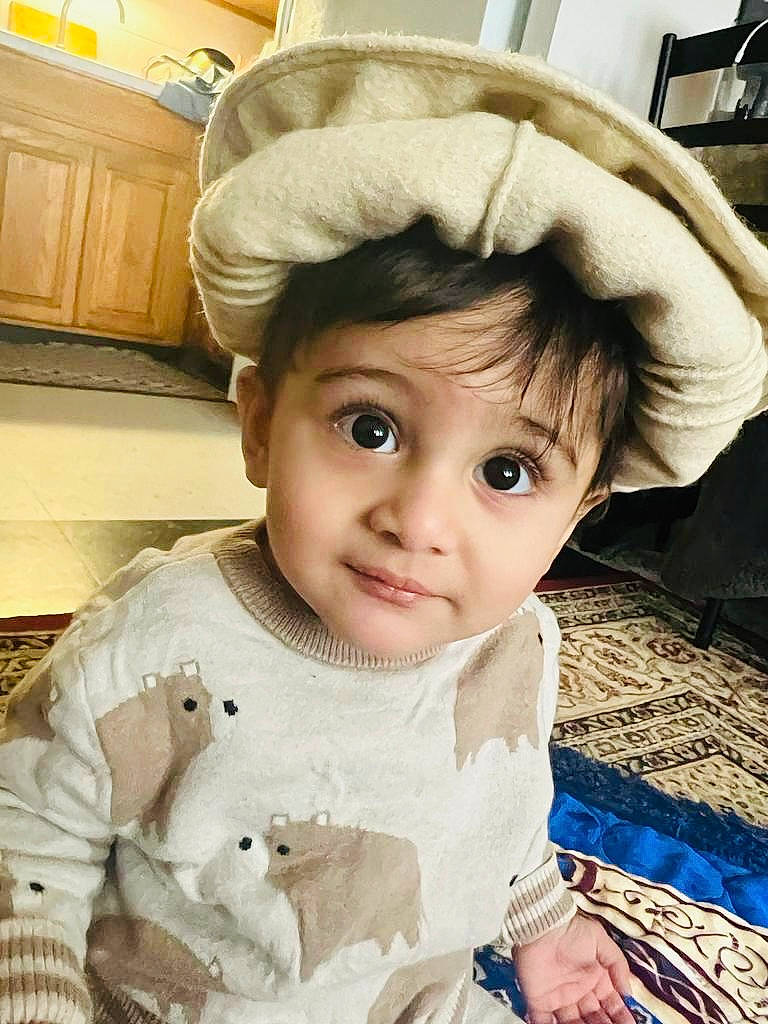 Ali joined the competition — help win amazing prizes! baby_toddler_clothing, cabinetry, cap, cheek, chin, cool, dress, eye, eyebrow, hairstyle, happy, head, headgear, iris, lip, nose, person, skin, sleeve, smile