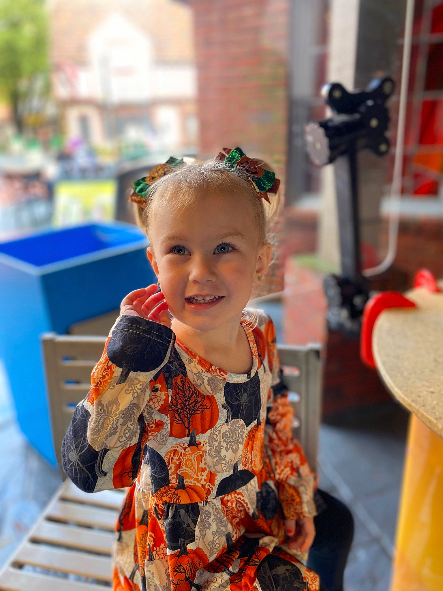 Elaina is registered to the contest to win money with this photo: baby, baby_toddler_clothing, child, event, fashion_accessory, fun, hairstyle, happy, jewellery, joy, leisure, orange, pattern, person, recreation, sleeve, smile, temple, toddler, tourism