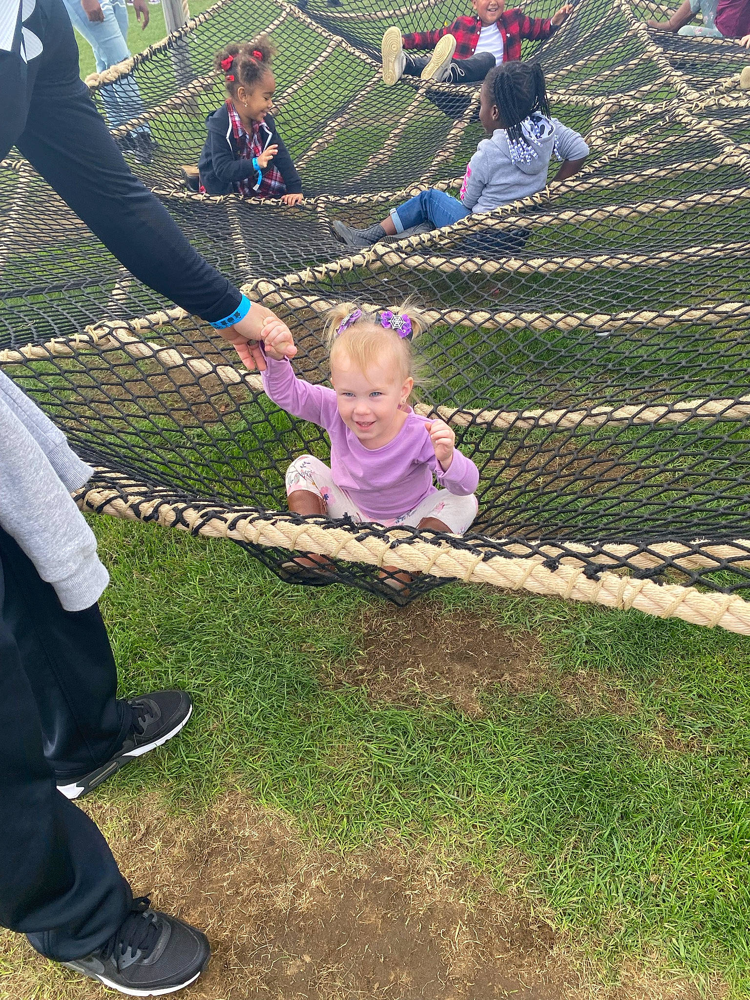 Elaina is registered to the contest to win money with this photo: child, clothing, event, fun, garden, grass, happy, joy, lawn, leaf, leisure, people, people_in_nature, person, plant, recreation, sandal, sitting, soil, spring