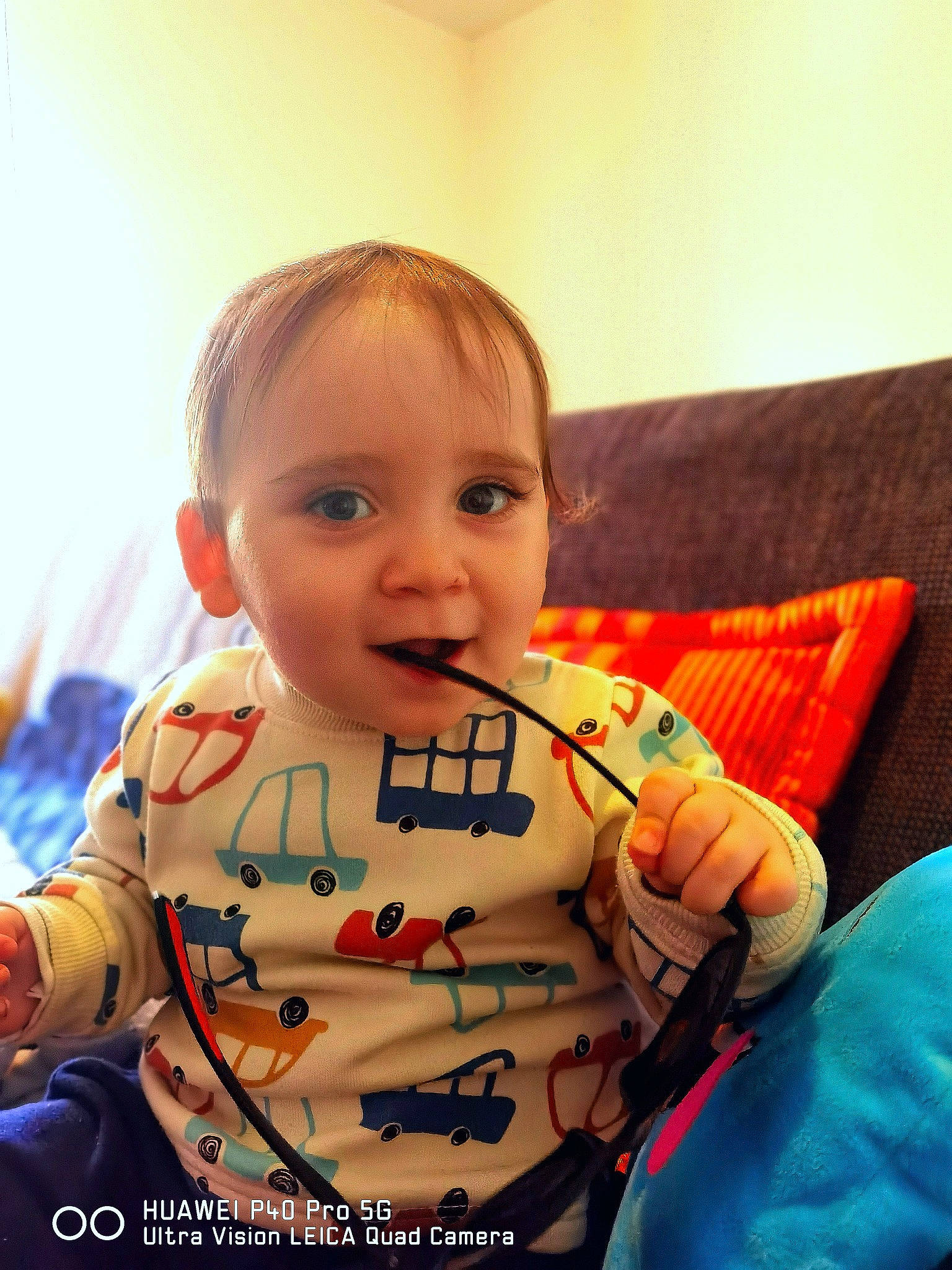 Alvaro participe au concours pour gagner de l'argent avec cette photo : baby, baby_toddler_clothing, cheek, child, comfort, eyebrow, finger, fun, happy, iris, nose, pattern, person, room, sitting, skin, sleeve, smile, t_shirt, toddler