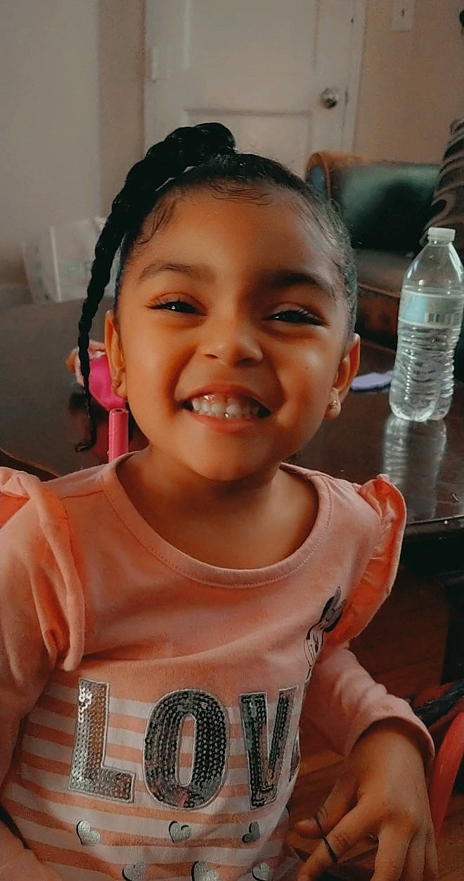 Anaiyah joined the competition — help win amazing prizes! bottle, bottled_water, cheek, chin, drinking_water, ear, eyebrow, eyelash, facial_expression, forehead, gesture, happy, joy, lip, mineral_water, mouth, nose, organ, person, skin