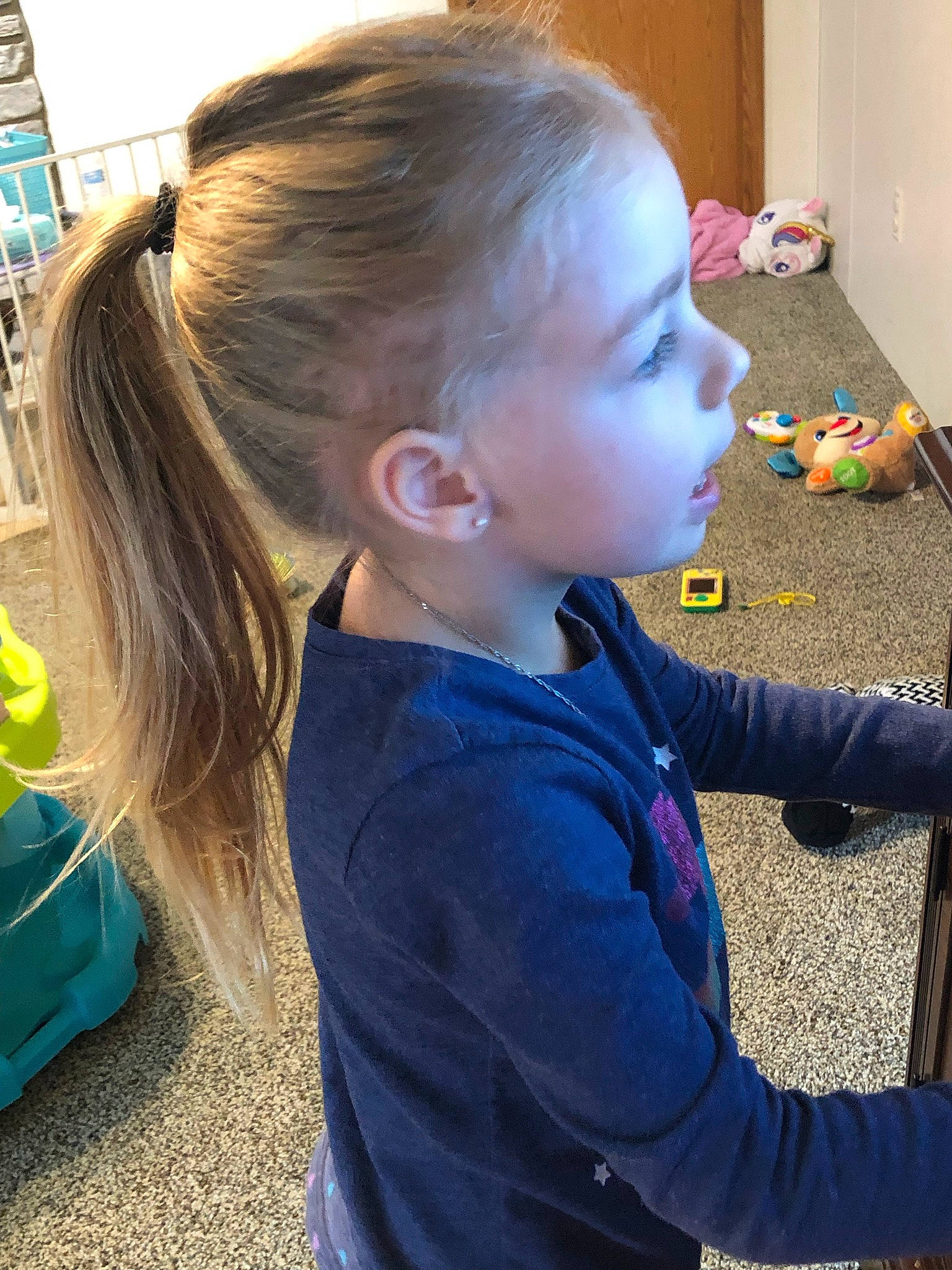 Lureina is registered to the contest to win money with this photo: baby, baby_toddler_clothing, brown_hair, child, electric_blue, flooring, fun, grass, green, hair, hairstyle, head, iris, nose, person, play, sitting, sleeve, summer, t_shirt