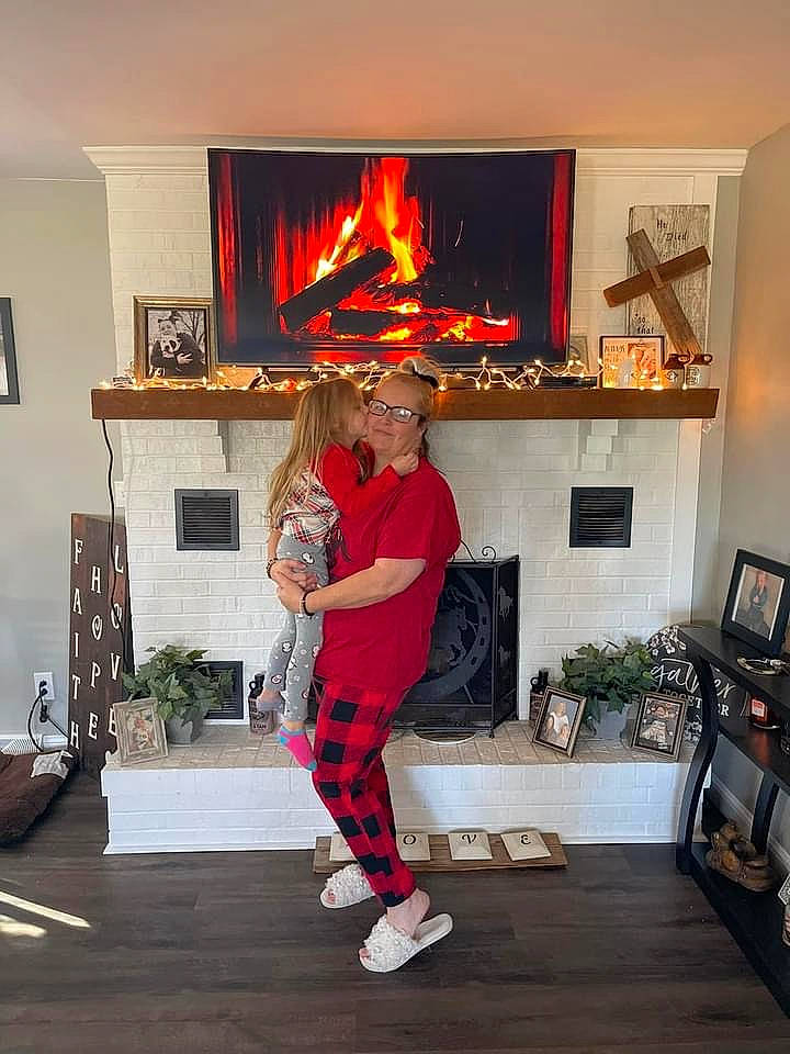 Lureina is registered to the contest to win money with this photo: couch, dance, door, event, floor, flooring, fun, gas_stove, hardwood, hearth, heat, houseplant, interior_design, joy, lamp, living_room, person, picture_frame, plant, room