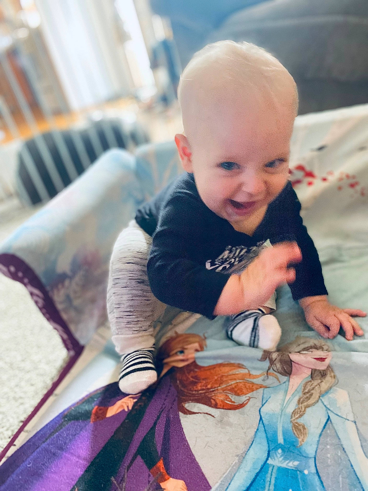 Oaklen joined the competition — help win amazing prizes! baby, baby_products, baby_toddler_clothing, cheek, child, dress, fun, happy, iris, linens, pattern, person, portrait_photography, purple, sitting, skin, sleeve, smile, t_shirt, toddler