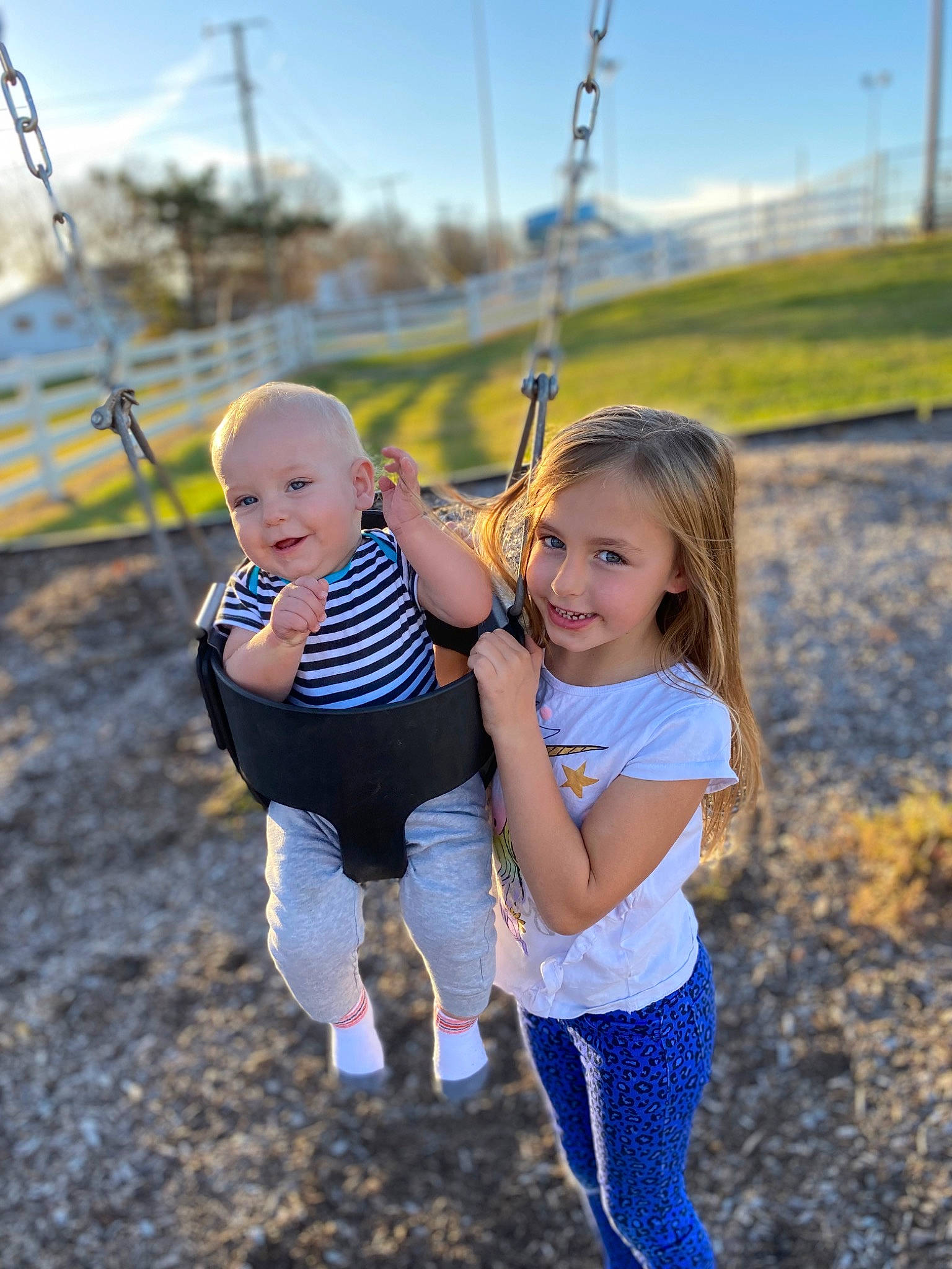 Aleana is registered to the contest to win money with this photo: child, clothing, face, fun, gesture, grass, happy, joy, leaf, leisure, morning, nature, people_in_nature, person, recreation, sky, smile, standing, summer, sunlight
