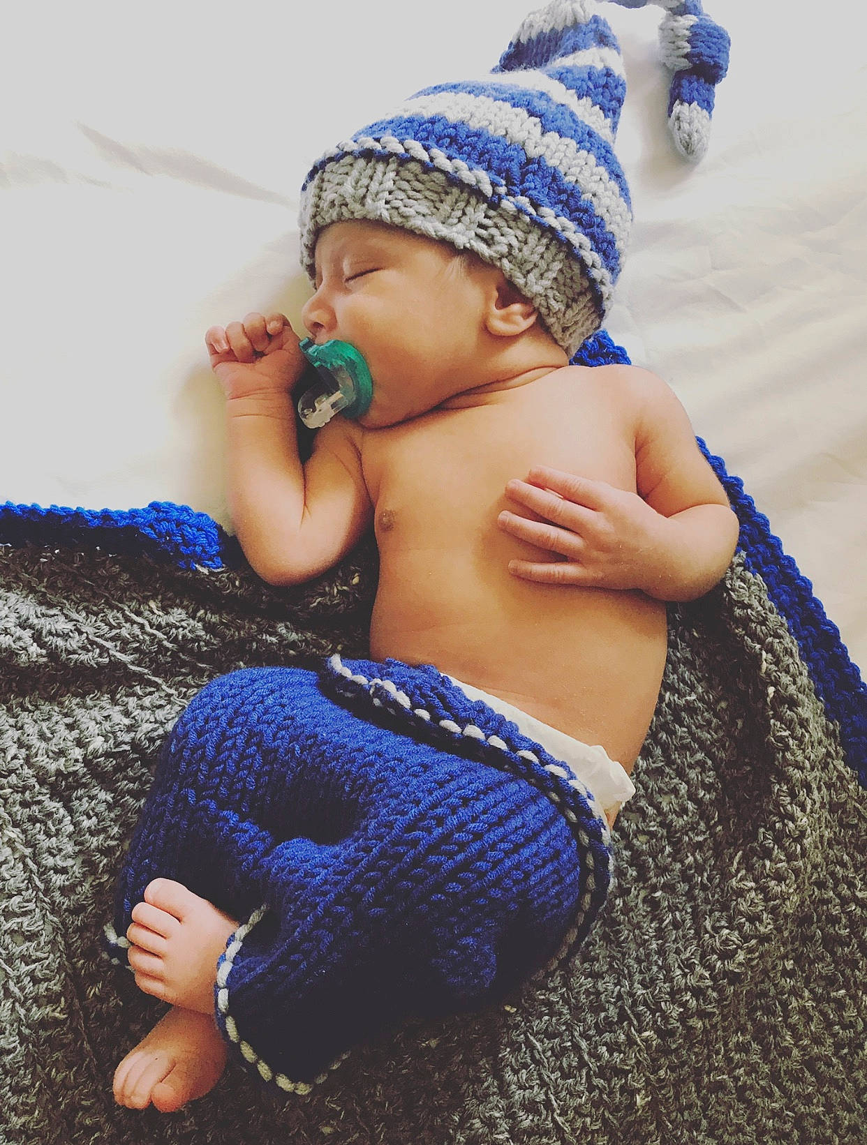 Isaiah Veglia joined the competition — help win amazing prizes! art, baby, beanie, blue, bonnet, cap, child, cobalt_blue, crochet, electric_blue, fashion_accessory, finger, hand, headgear, knit_cap, knitting, person, toddler, wool