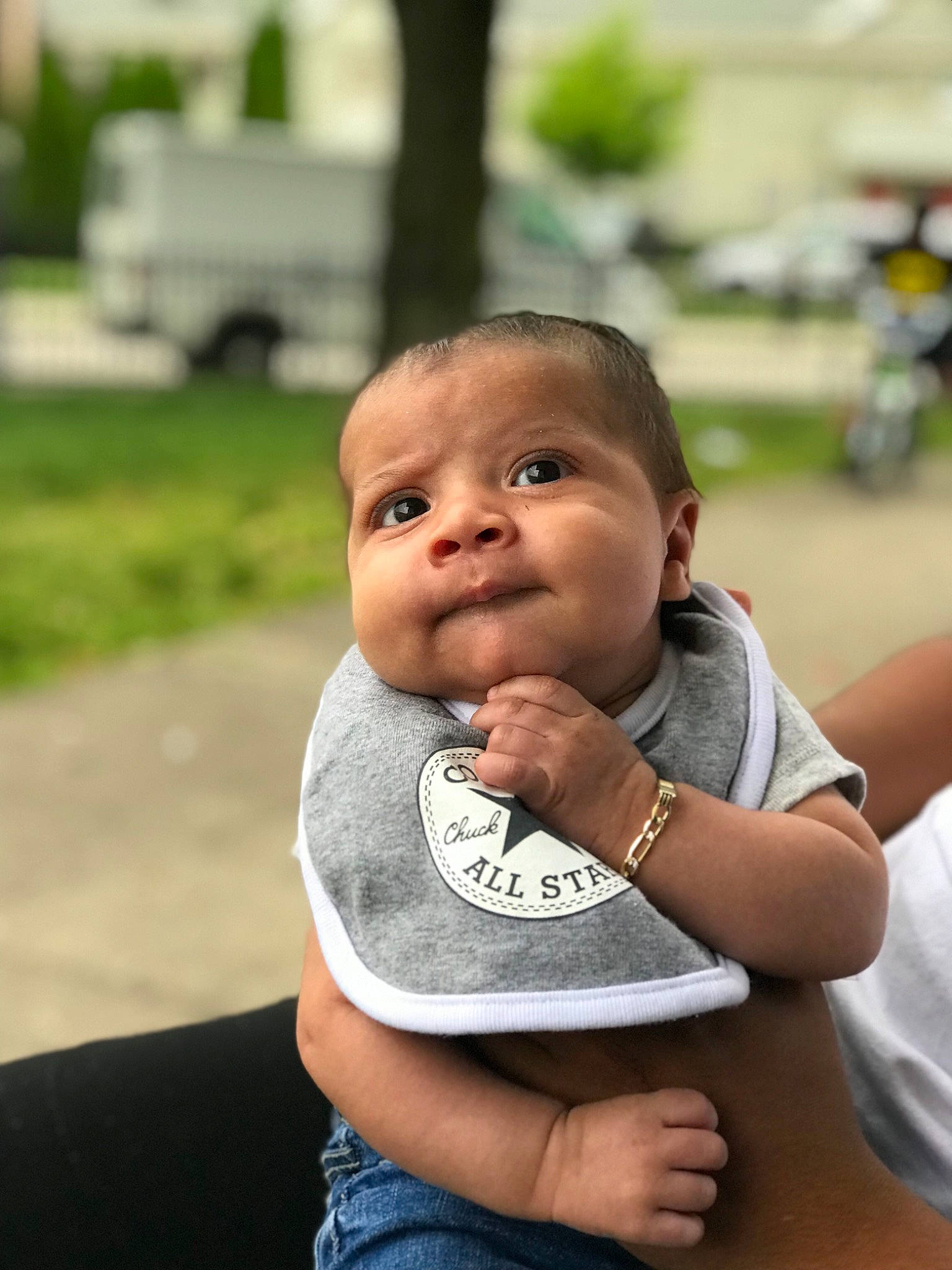 Isaiah Veglia is registered to the contest to win money with this photo: baby, cheek, child, chin, eye, face, fun, grass, hand, head, male, nose, people, person, photography, recreation, sitting, skin, smile, toddler