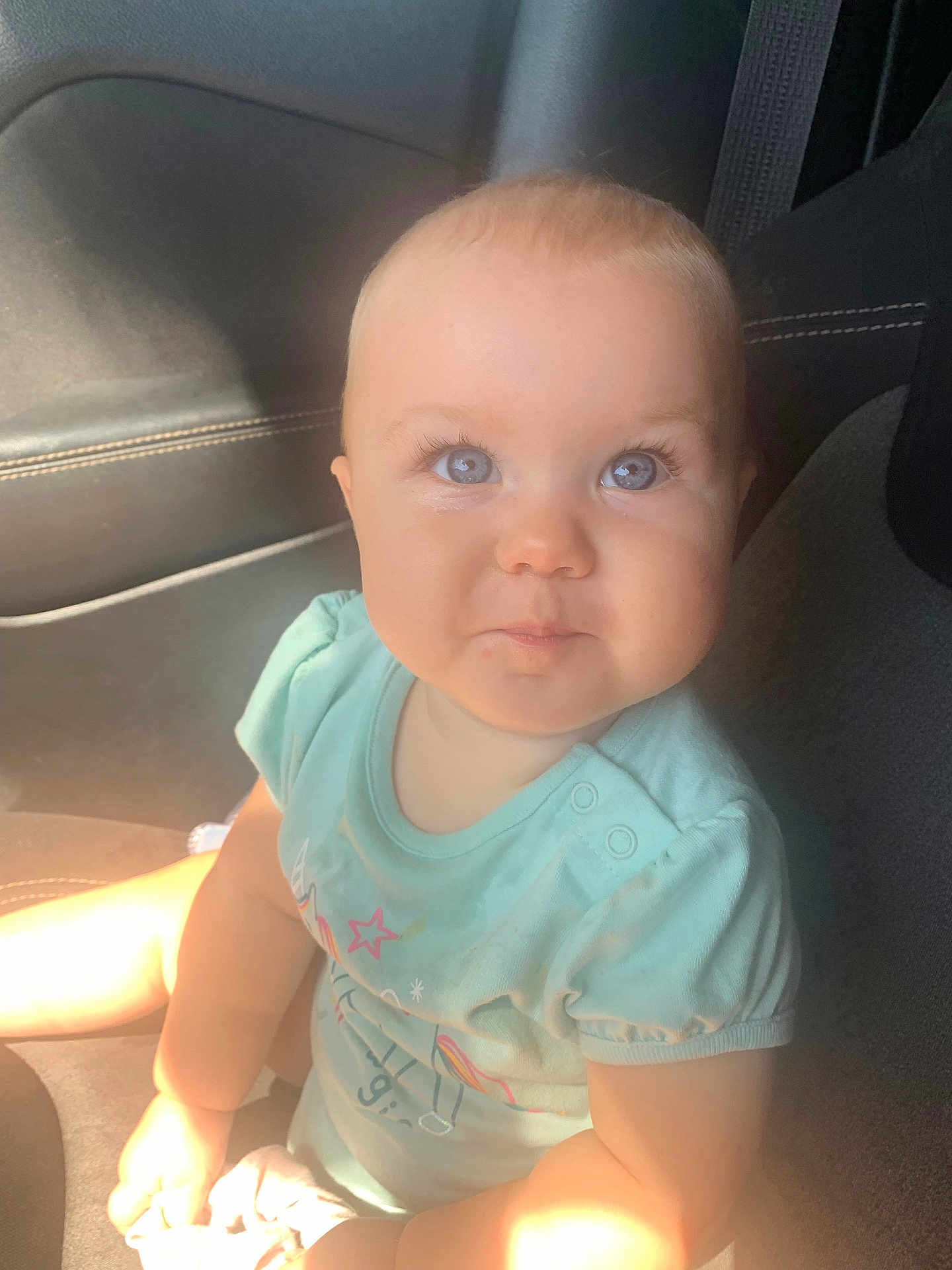 Samantha Lemos is registered to the contest to win money with this photo: accessories, baby, belt, bodypart, clothing, cushion, face, head, homedecor, mouth, person, photography, portrait, selfie, shorts, sitting, t_shirt, teeth, transportation, vehicle