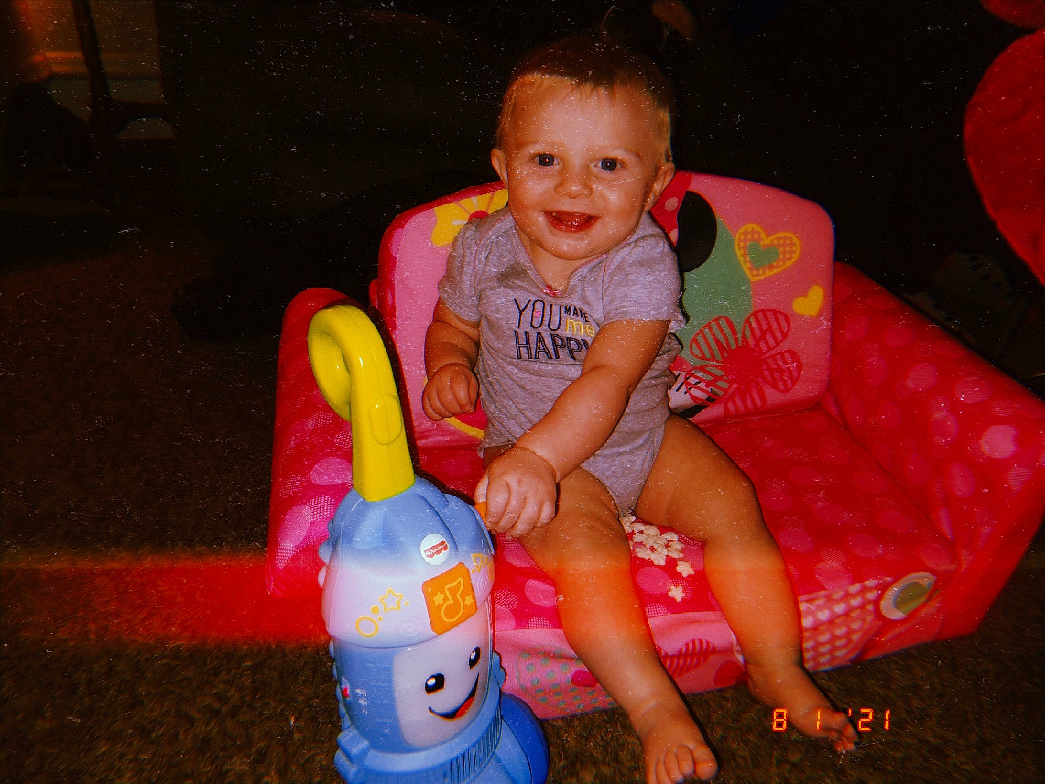 Elaina is registered to the contest to win money with this photo: baby_toddler_clothing, comfort, electric_blue, event, fun, happy, human_leg, joy, lap, leisure, magenta, organ, person, pink, red, riding_toy, sitting, smile, t_shirt, thigh