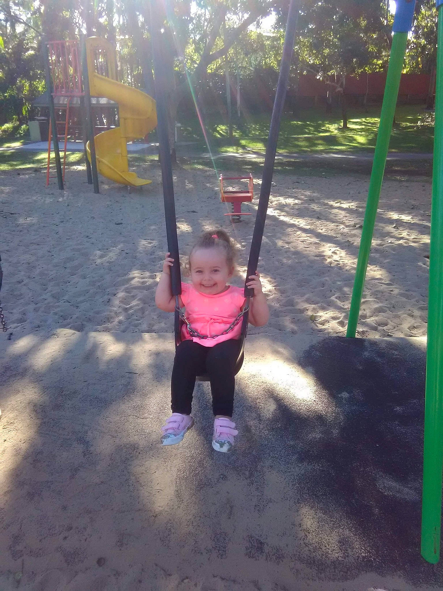 Lacie joined the competition — help win amazing prizes! fun, human_settlement, joy, leisure, outdoor_play_equipment, person, play, playground, public_space, recreation, swing, toddler