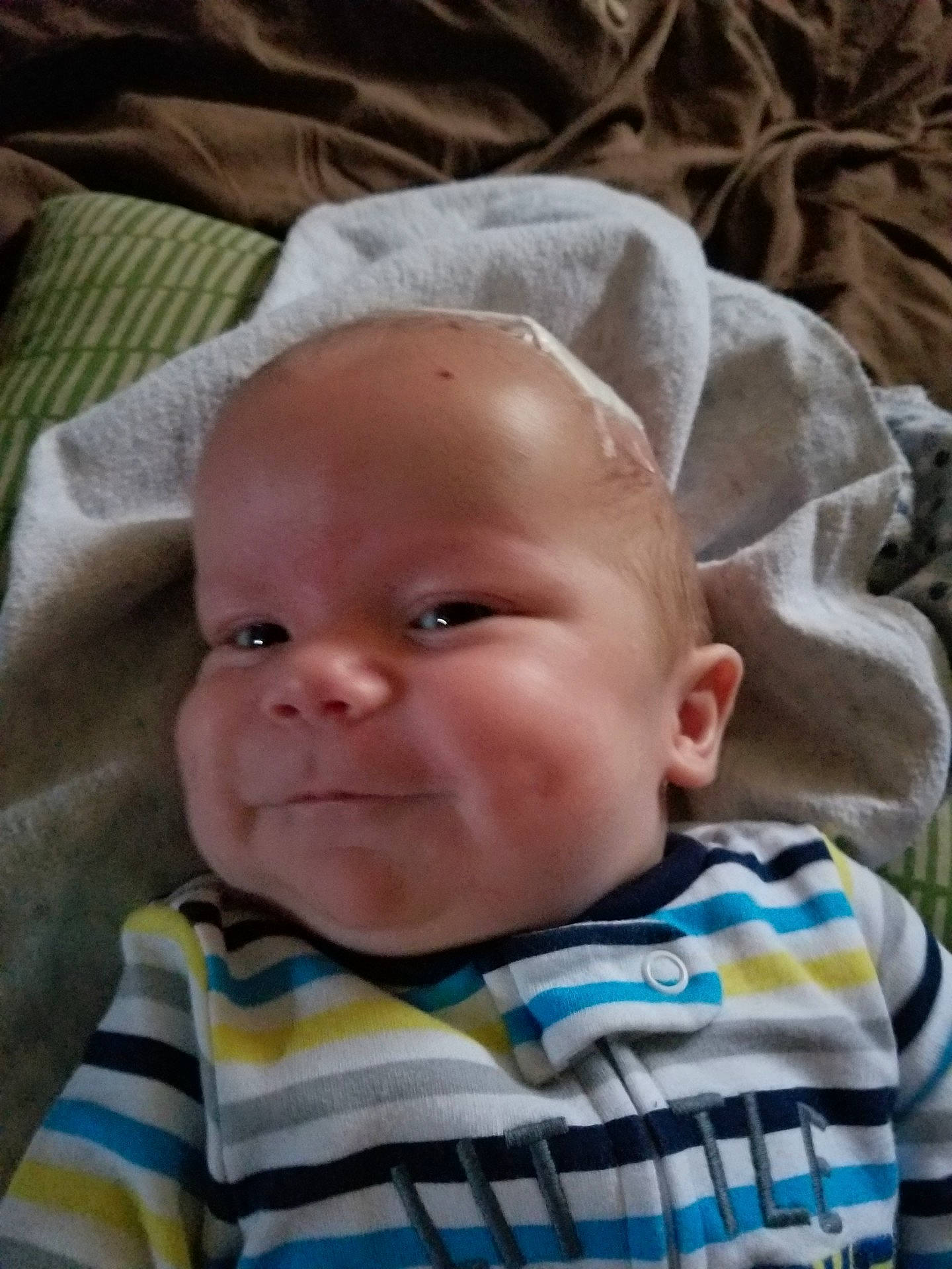 Marshall is registered to the contest to win money with this photo: boy, cheek, child, day, ear, eye, face, forehead, head, infant, iris, nose, person, skin, smile, toddler