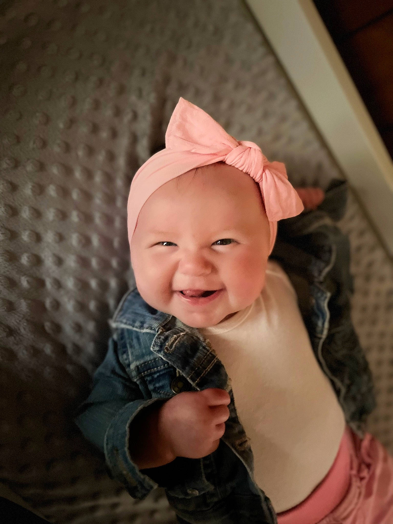 Briella is registered to the contest to win money with this photo: baby, baby_laughing, baby_toddler_clothing, cap, cheek, child, fashion_accessory, flash_photography, fun, hair_accessory, happy, head, headband, headpiece, headwear, laugh, peach, person, portrait_photography, sleeve