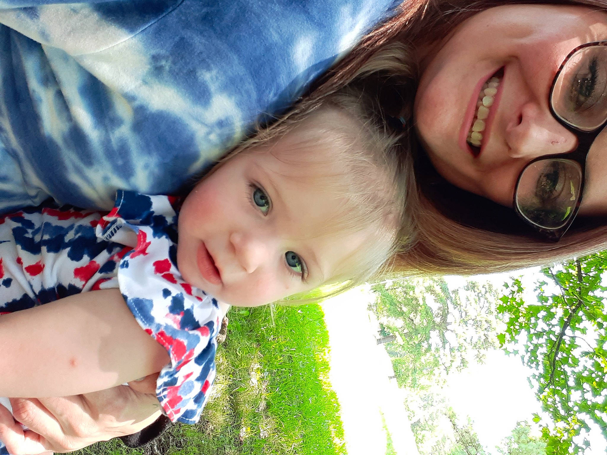 Delaney is registered to the contest to win money with this photo: chin, face, facial_expression, flash_photography, grass, hair, hand, happy, iris, joy, leisure, lip, nose, people_in_nature, person, plant, skin, smile, summer, sunlight