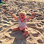 child, beach, sand, water, sunlight, happy, smiling, summer, outdoor, play, ocean, shore, casual_clothing, blond_hair, sunshine, fun, vacation, relaxation, person, nature