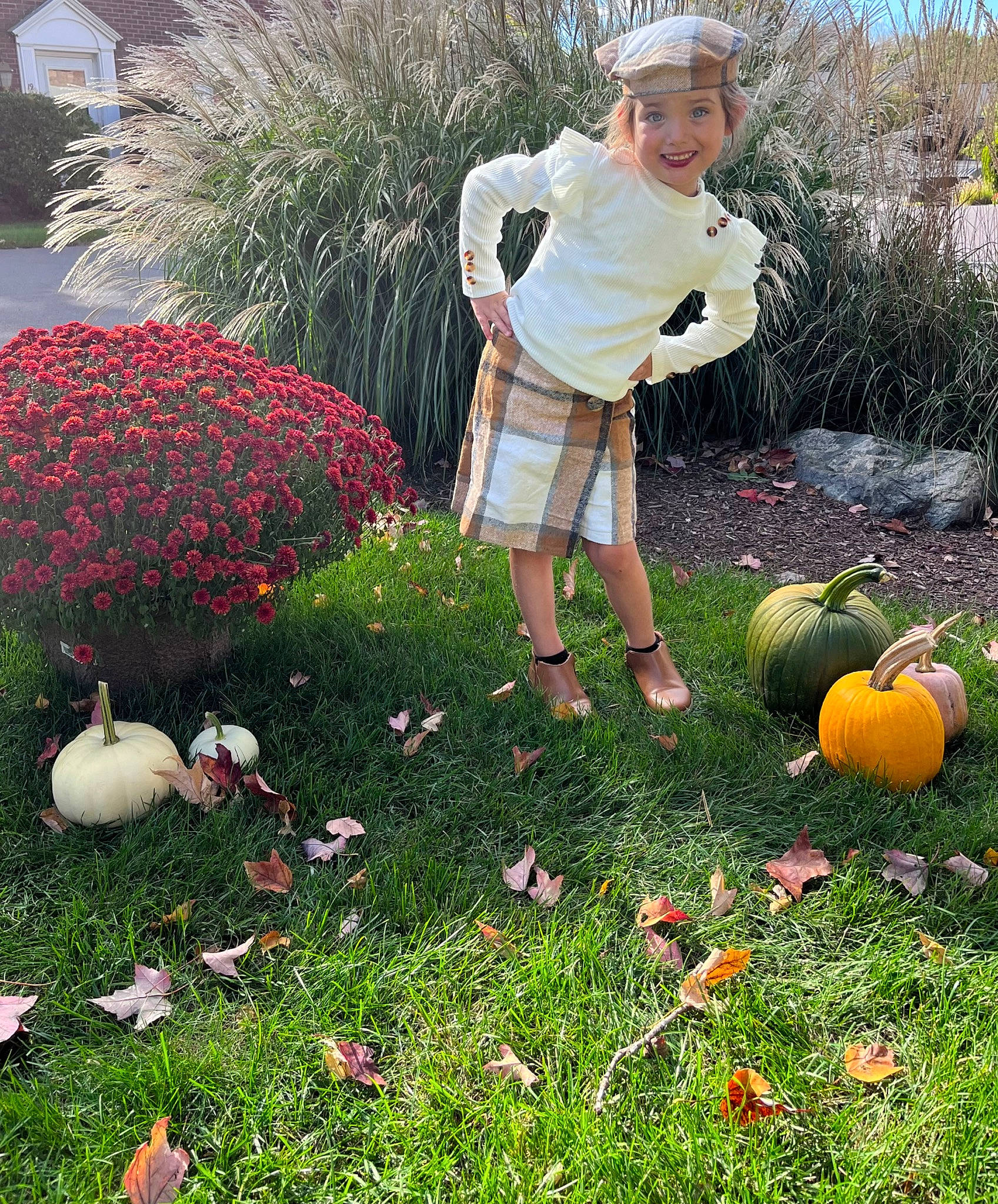 Madi joined the competition — help win amazing prizes! calabaza, cucurbita, flower, garden, gourd, grass, grass_family, green, groundcover, headwear, joy, lawn, leisure, natural_foods, people_in_nature, person, petal, plant, pumpkin, toddler