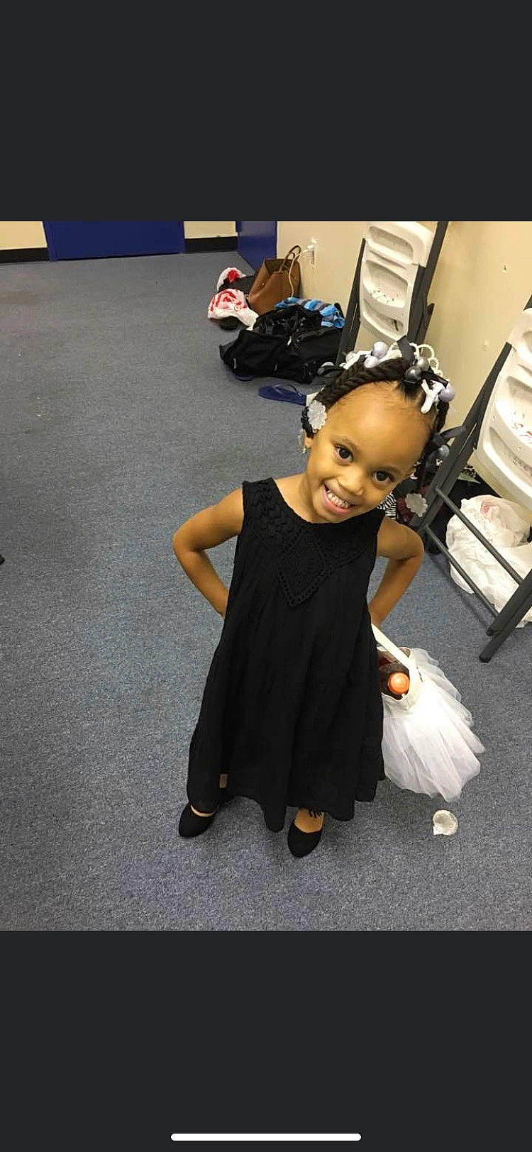 Jermylah is registered to the contest to win money with this photo: ankle, baby_toddler_clothing, bag, child, child_model, day_dress, dress, floor, flooring, hair_accessory, joy, luggage_and_bags, one_piece_garment, person, snapshot, style, toddler