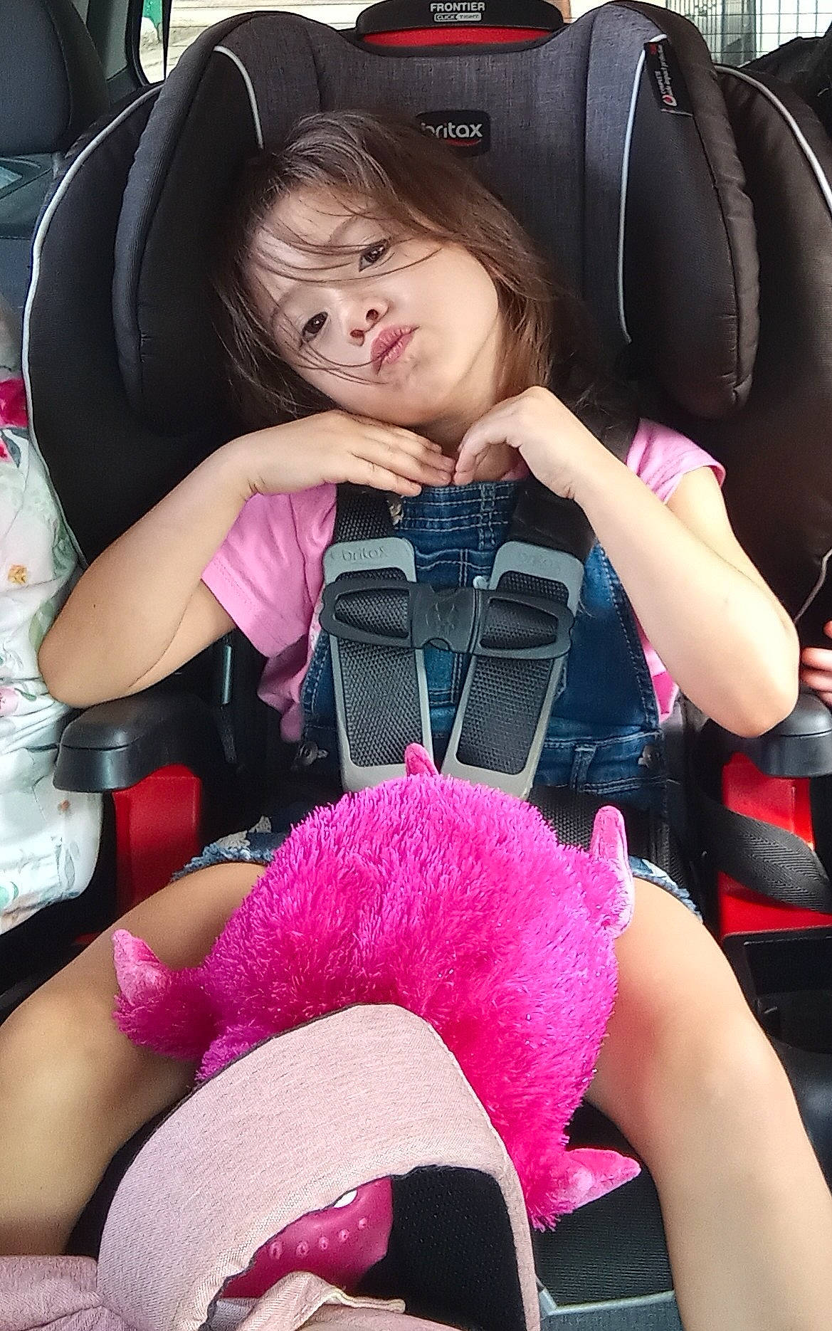 Amore' is registered to the contest to win money with this photo: auto_part, automotive_design, black, black_hair, car_seat, car_seat_cover, comfort, cool, finger, head_restraint, human_body, joint, leg, magenta, motor_vehicle, mouth, person, pink, steering_wheel, thigh