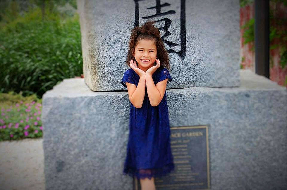 Auna is registered to the contest to win money with this photo: beauty, child, clothing, day, dress, facial_expression, fun, girl, happiness, joy, person, photograph, photography, portrait_photography, shoulder, skin, smile, snapshot, standing, toddler