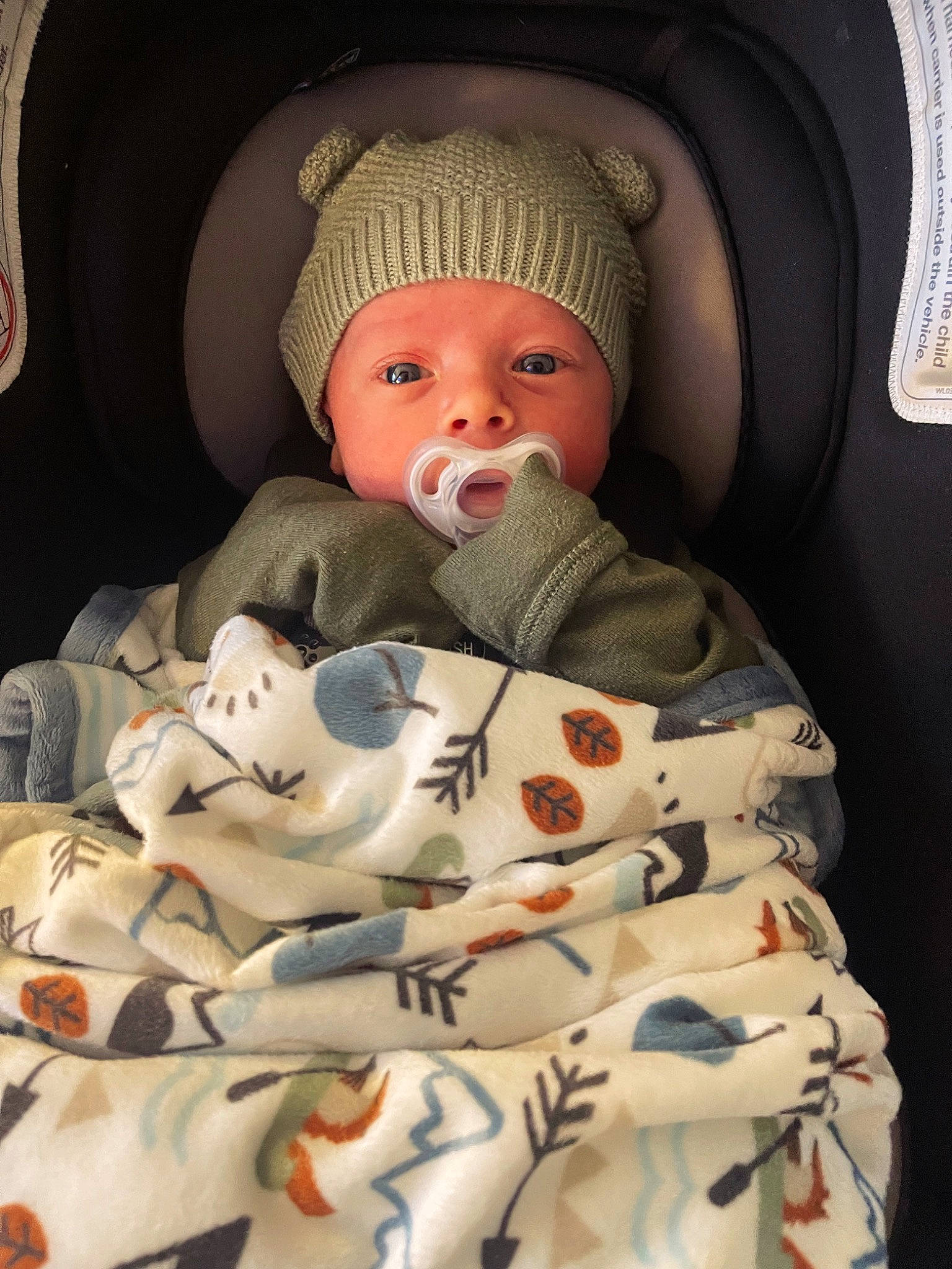 Archer joined the competition — help win amazing prizes! baby, baby_products, baby_safety, baby_sleeping, baby_toddler_clothing, beanie, car_seat, carmine, cheek, child, comfort, hat, headwear, linens, pattern, person, room, sitting, sleeve, toddler