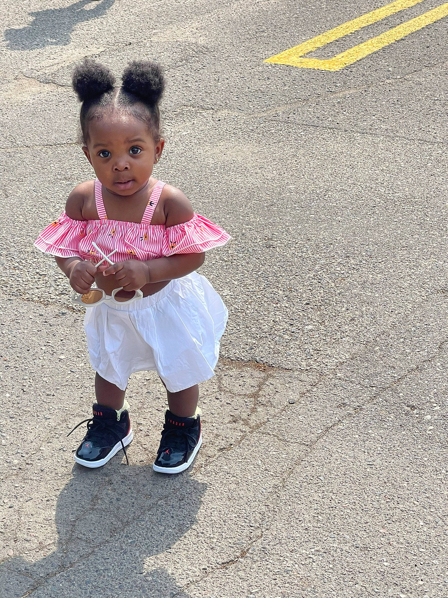 Lydia joined the competition — help win amazing prizes! asphalt, child, fun, grass, hair, happy, head, human_leg, leisure, pedestrian, people_in_nature, person, recreation, road, road_surface, sidewalk, sitting, smile, tar, toddler