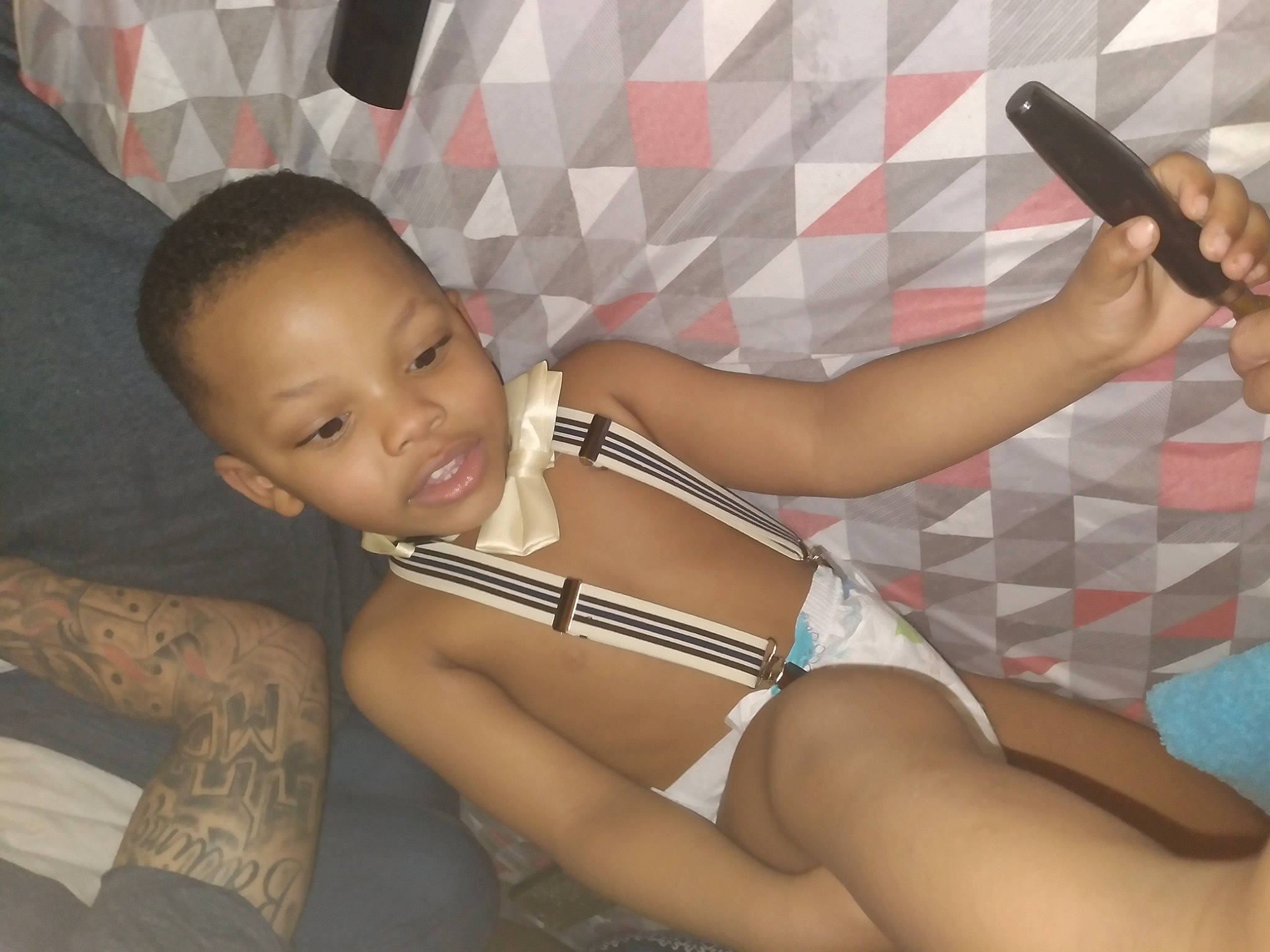 Aaliyah is registered to the contest to win money with this photo: arm, black_hair, child, finger, leg, person, thigh