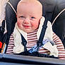 Walker joined the competition — help win amazing prizes! baby, infant, smiling, blue_eyes, rosy_cheeks, stroller, car_seat, harness, seatbelt, fleece_vest, striped_shirt, closeup, portrait, happy, cute, safety_strap, buckle, light_hair, outdoor, sunlight