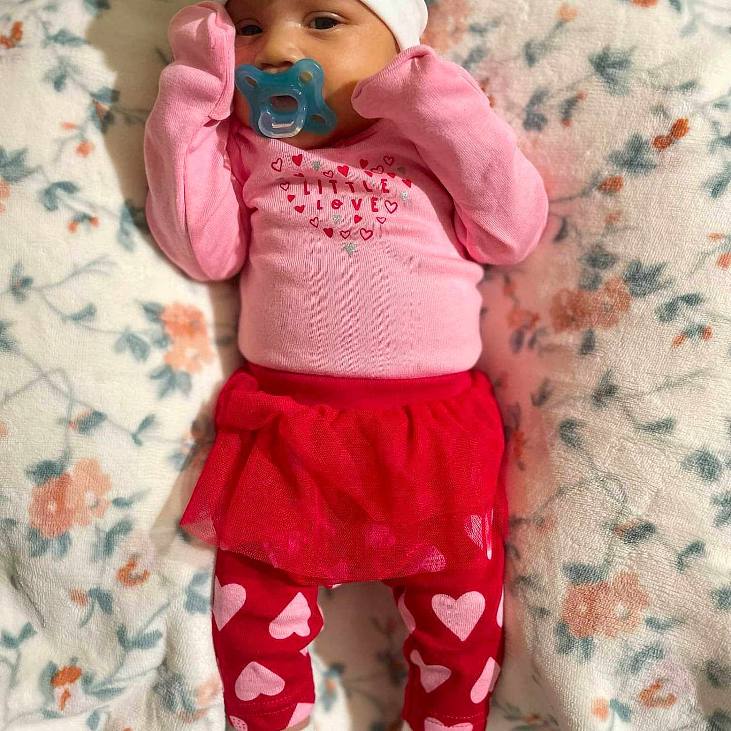 Zaylah is registered to the contest to win money with this photo: baby, blanket, clothing, doll, face, head, hoodie, hosiery, infantbed, knitwear, person, sleeve, sock, standing, sweater, sweatshirt, toy, yawning