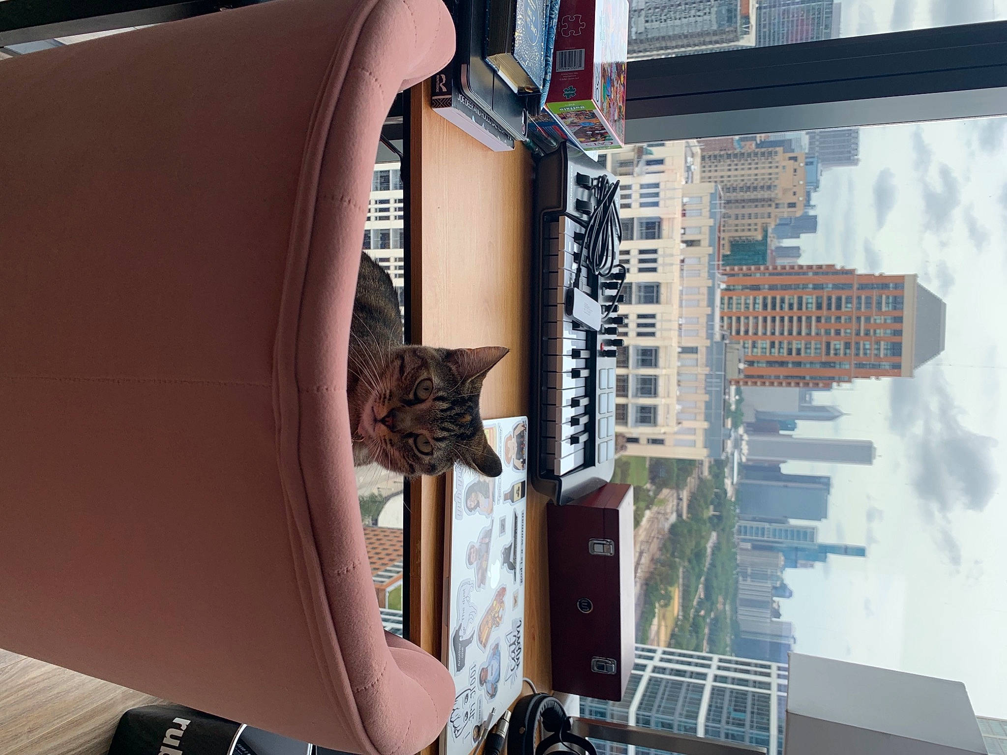 Ari joined the competition — help win amazing prizes! automotive_design, automotive_exterior, automotive_tire, building, city, cloud, condominium, facade, line, material_property, mixed_use, photograph, sky, skyscraper, snapshot, tower, tower_block, urban_design, vehicle_door, wood